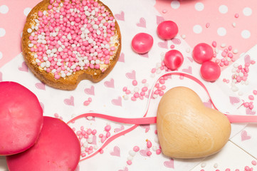 rusk with white and pink aniseed sprinkles, Muisjes, traditional food in The Netherlands when a baby girl is born