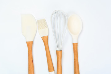 different kitchenware on a colored background top view. Cooking appliances.