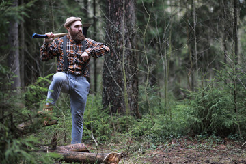 A bearded lumberjack with a large ax