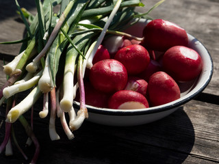Fresh organic radish on an old wooden table