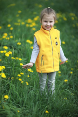 A little child on a spring day walk