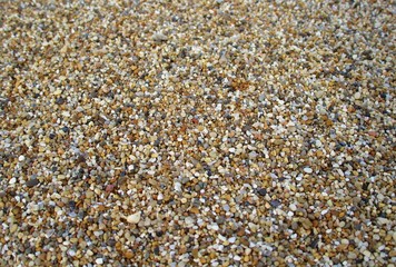 Kies- Sandstrand in der Nahaufnahme Makro