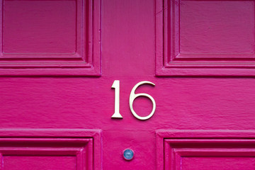 House number sixteen with the 16 in bronze