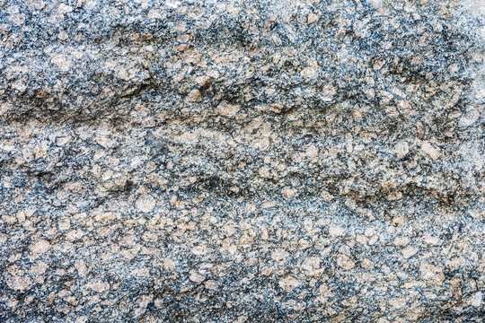 Stone patterned background for design. Multicolored granite in natural pattern. The mix of colors in the form of natural stone. High resolution photo
