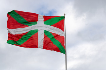 Fototapeta na wymiar The flag of euskadi (Basque country), the autonomous Basque community in Spain, is the ikurriña, designed by Sabino Arana and his brother Luis Arana in 1894