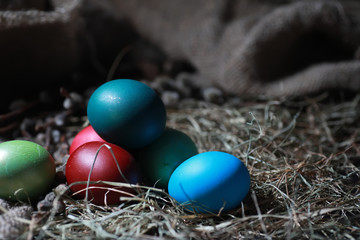 Easter painted eggs on burlap
