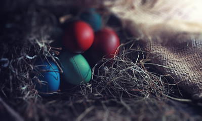Easter painted eggs on burlap