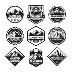 Set of adventure outdoor concept badges, camping emblem, mountain climbing logo in flat style. Exploration sticker symbol. Creative vector illustration. Graphic design in black and white colors.   - 260108627