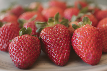 Fresh strawberry background. Close up view of red ripe strawberries.  