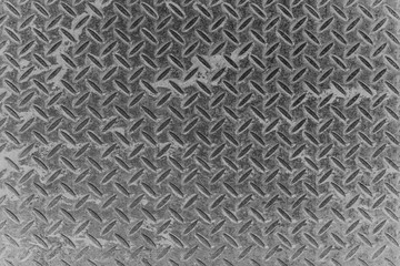 Top view diamond pattern old metal plate surface background and texture.