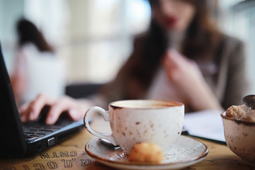 Girl eating coffee cakes