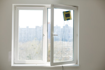 cleaning windows at home with robotic cleaner