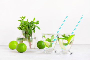 Two glasses of Infusion water or fresh lemonade