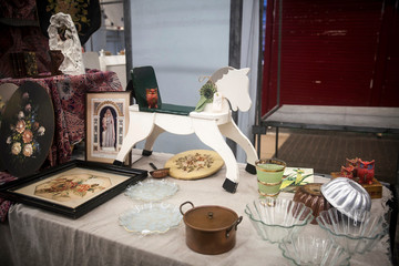 Rocking horse and utensils at a flea market in London