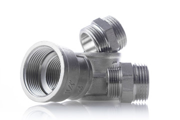 metal fittings over white background