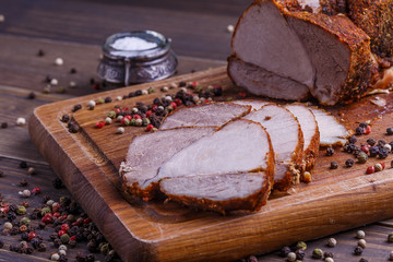 veal roll on wooden board