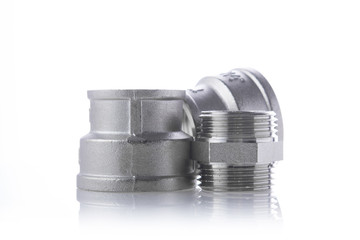 metal fittings over white background