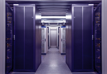 Network workstation blue server room interior in data centre. Web telecommunication, internet connection, cloud computing, networking connectivity. Technology and cyberspace concept