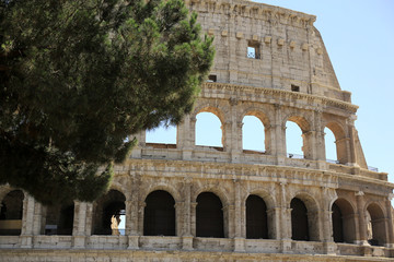 Rome, The Majestic Coliseum. Italy. Colosseum Rome. Ruins of the ancient Roman amphitheatre. Travel to Italy, Crowd and queue. Sunny day and blue sky