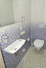 Bathroom interior with finishing by a mosaic tile