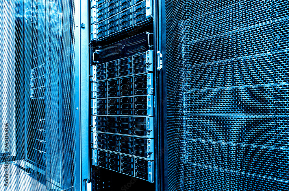 Aufkleber close up inside data server room. high capacity hard drive disk storage rack. blade server in datace
