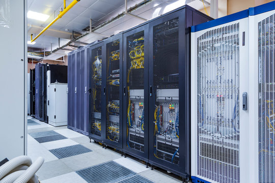 Control Modules With Modern Communication Equipment, Switches And Cables In Server Room. Data Center With Control Terminal, Server Rackes.