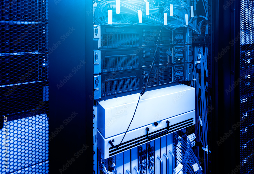 Aufkleber severs computer in rack at the large data center under blue neon light. network and technology futur