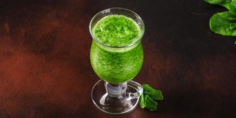 green smoothie. cocktail of vegetables and herbs - the concept of a healthy lifestyle. food background. top image