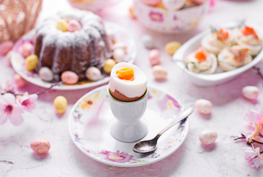 Easter breakfast.Cake and eggs with salmon