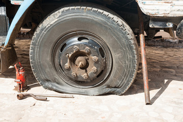 Flat tire on old truck