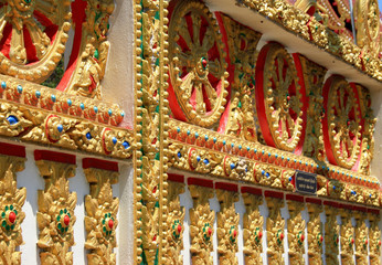 11 February 2019, Phuket, Karon beach, Thailand. Drawings on the fence of the Buddhist temple Wat Karon.