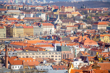 Fototapeta na wymiar Aerial view of Prague rooftops and skyline from Petrin hill, Prague, Czech Republic
