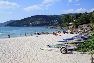 Fototapeta premium February 14, 2019, Phuket, Patong beach, Thailand. Sand, sea and people on the shore.