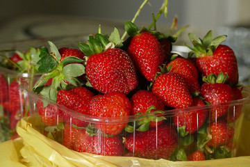 natural strawberries in a transparent container, close-up, 1 kg natural strawberry in package,...