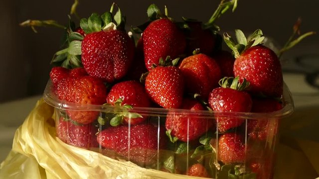 1 kg natural strawberry in package, close-up,