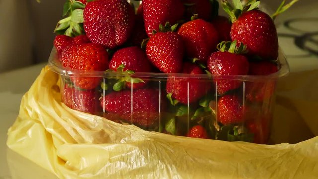 1 kg natural strawberry in package, close-up,