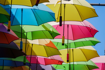 Colorful umbrellas hanging in the famous Orange Street Alley