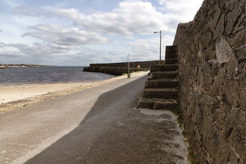 Pier and beach in Galway Bay