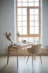 Stylish workspace near the window