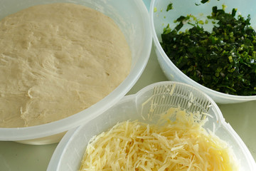 woman making dough with rolling pin, woman making dough with spinach,