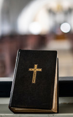 Holy Book laying in front i a Scandinavian church`s room