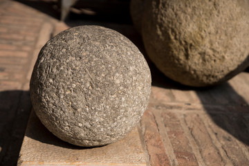close up cannonball, St Michael Castle, Ferrara, Italy