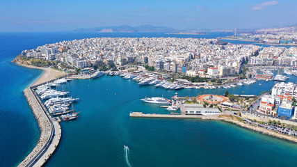 Naklejka na ściany i meble Aerial photo of iconic port of Marina Zeas with boats docked, port of Piraeus , Attica, Greece