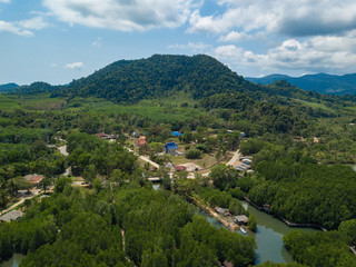 Fototapeta na wymiar Village in the mangrove forest aerial view. Ko Chang island, Thailand