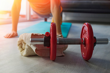 dumbells with girl doing sport