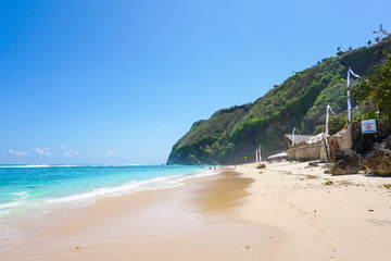 Secluded golden sandy beach, azure ocean water, Indonesia , Bali, 09.08.2018