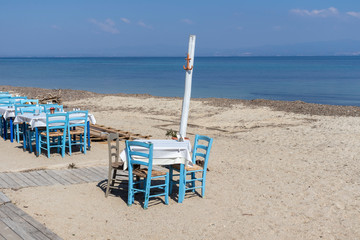 Typical Greek restaurant at the beach of Nea Fokea, Kassandra, Chalkidiki, Central Macedonia, Greece