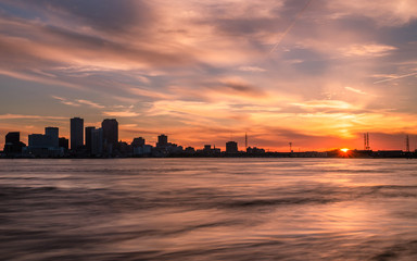 Fototapeta na wymiar Downtown New Orleans under sunset