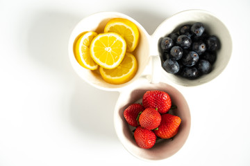 Strawberries, Grapes & Lemons in a Dish