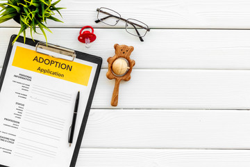 application form for adopt child on white background top view mock up